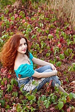 Ukrainian mail order bride Leyla from Zolotonosha with red hair and green eye color - image 5
