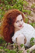 Ukrainian mail order bride Leyla from Zolotonosha with red hair and green eye color - image 2