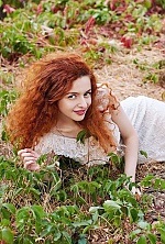 Ukrainian mail order bride Leyla from Zolotonosha with red hair and green eye color - image 9