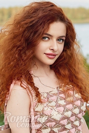 Ukrainian mail order bride Leyla from Zolotonosha with red hair and green eye color - image 1