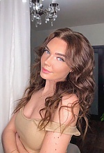 Ukrainian mail order bride Ulyana from Minsk with light brown hair and blue eye color - image 4