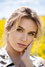 Ukrainian mail order bride Yulia from Minsk with blonde hair and blue eye color - image 2