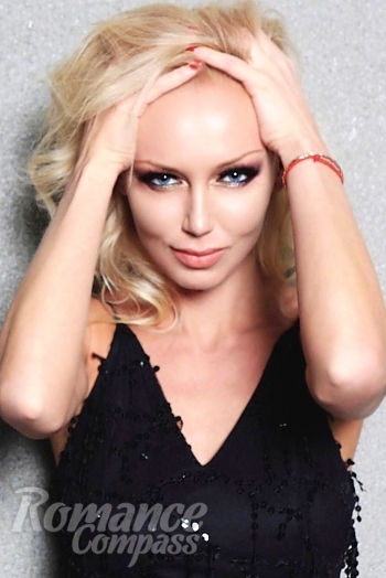 Ukrainian mail order bride Ekaterina from Moscow with blonde hair and blue eye color - image 1