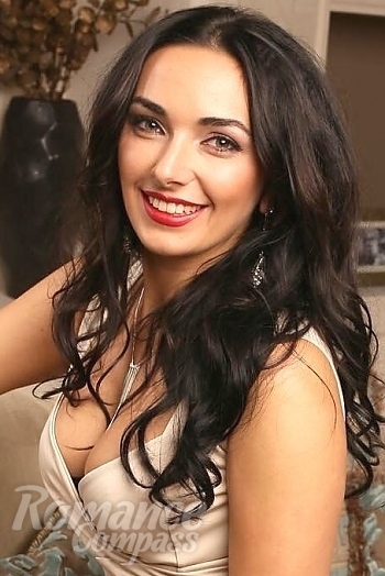 Ukrainian mail order bride Juliya from Kiev with black hair and green eye color - image 1