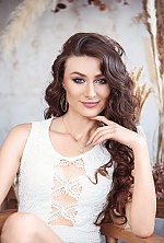 Ukrainian mail order bride Diana from Temirtau with light brown hair and blue eye color - image 13