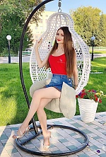 Ukrainian mail order bride Diana from Temirtau with light brown hair and blue eye color - image 4