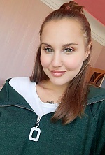 Ukrainian mail order bride Irina from Penza with light brown hair and green eye color - image 3