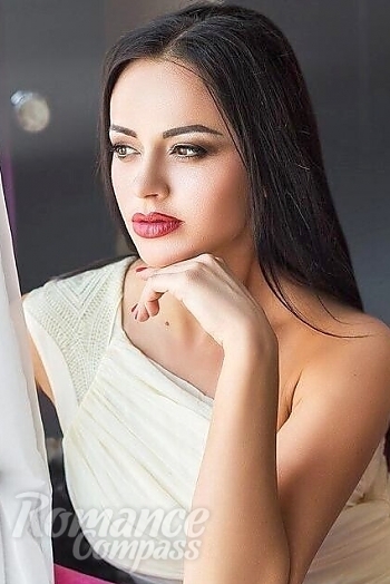 Ukrainian mail order bride Natalia from Kharkov with black hair and brown eye color - image 1