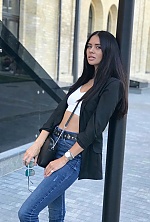 Ukrainian mail order bride Yana from Kiev with black hair and green eye color - image 11