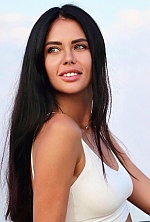 Ukrainian mail order bride Yana from Kiev with black hair and green eye color - image 14