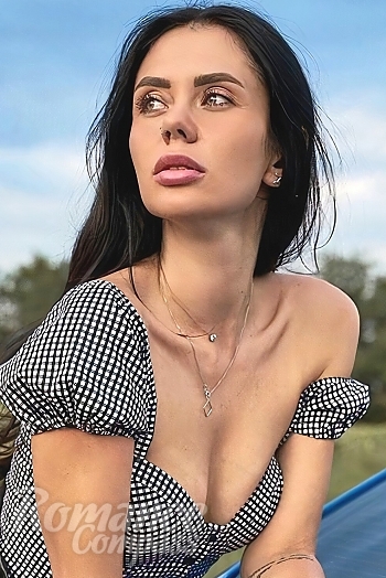 Ukrainian mail order bride Yana from Kiev with black hair and green eye color - image 1