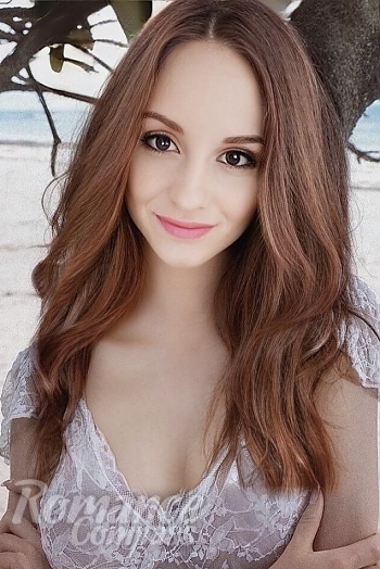Ukrainian mail order bride Christina from Harkov with light brown hair and brown eye color - image 1
