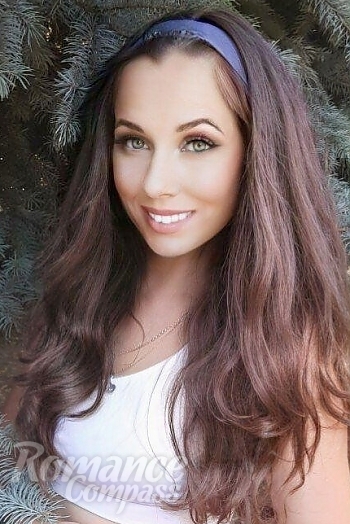 Ukrainian mail order bride Natalya from Cherkassy with light brown hair and green eye color - image 1