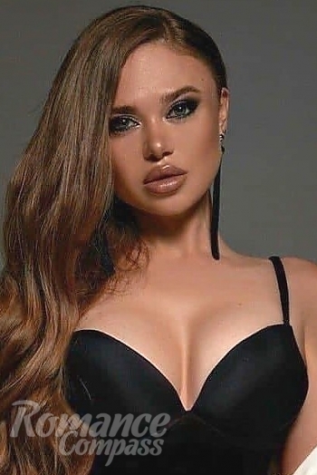 Ukrainian mail order bride Olesya from Kiev with light brown hair and green eye color - image 1