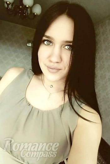 Ukrainian mail order bride Oksana from Mykolayv with black hair and grey eye color - image 1