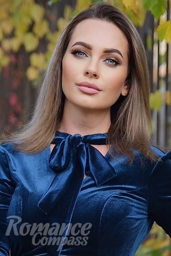 Ukrainian mail order bride Evgeniya from Kiev with light brown hair and blue eye color - image 1