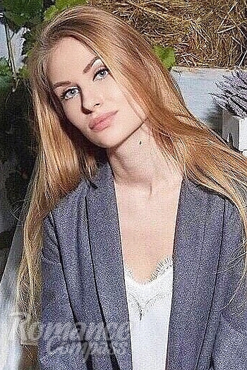 Ukrainian mail order bride Lena from Kiev with light brown hair and blue eye color - image 1