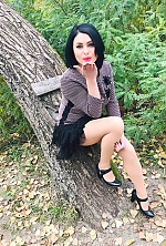 Ukrainian mail order bride Oksana from Poltava with black hair and brown eye color - image 23
