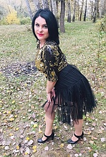 Ukrainian mail order bride Oksana from Poltava with black hair and brown eye color - image 20