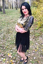Ukrainian mail order bride Oksana from Poltava with black hair and brown eye color - image 21