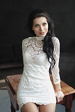 Ukrainian mail order bride Ekaterina from Odessa with black hair and green eye color - image 3