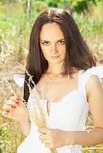 Ukrainian mail order bride Vera from Vinnytsia with brunette hair and black eye color - image 14
