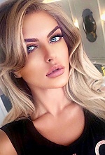 Ukrainian mail order bride Inga from New York with light brown hair and green eye color - image 7