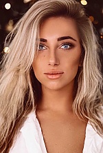 Ukrainian mail order bride Anastasya from Mazyr with blonde hair and blue eye color - image 7