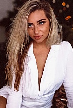 Ukrainian mail order bride Anastasya from Mazyr with blonde hair and blue eye color - image 10