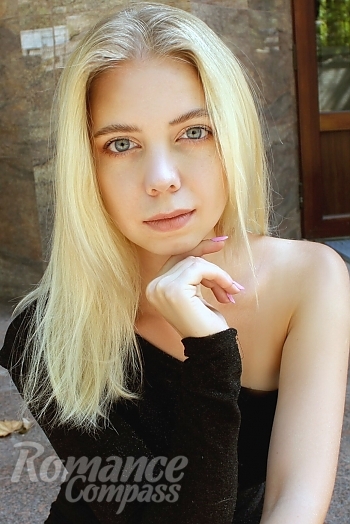 Ukrainian mail order bride Arina from Mykolaiv with blonde hair and blue eye color - image 1