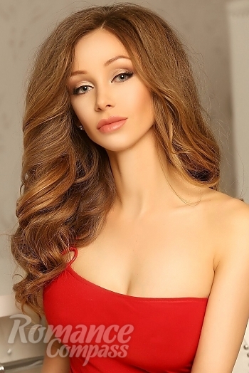 Ukrainian mail order bride Anna from Kyiv with light brown hair and green eye color - image 1