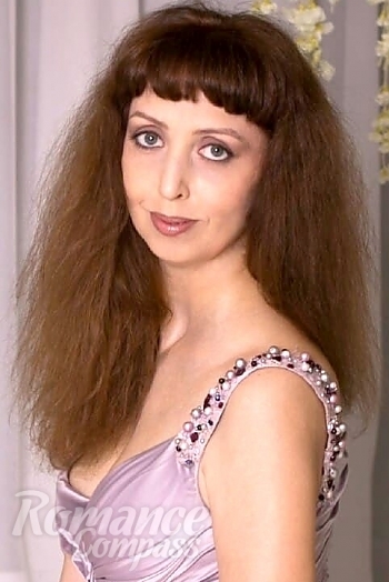 Ukrainian mail order bride Maritanna from Donetsk with light brown hair and brown eye color - image 1