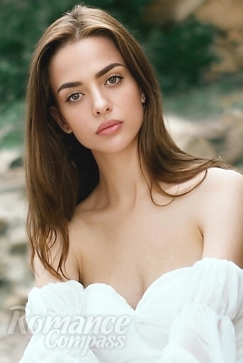 Ukrainian mail order bride Maria from Kharkiv with light brown hair and blue eye color - image 1