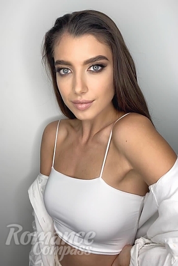 Ukrainian mail order bride Marina from Dubai with black hair and grey eye color - image 1