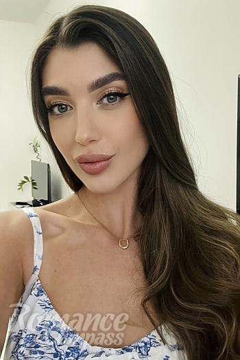 Ukrainian mail order bride Marina from Dubai with black hair and grey eye color - image 1