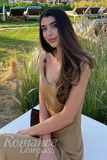 Ukrainian mail order bride Marina from Dubai with black hair and grey eye color - image 1