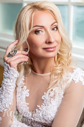 Ukrainian mail order bride Irina from Kharkiv with blonde hair and blue eye color - image 1