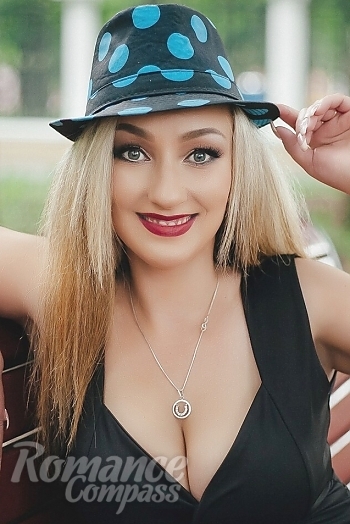 Ukrainian mail order bride Anna from Kolomak with blonde hair and green eye color - image 1