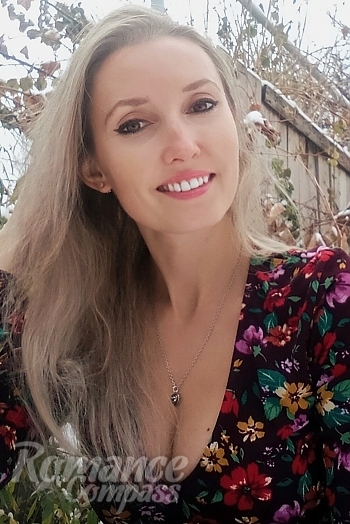 Ukrainian mail order bride Anastasia from Kiev with light brown hair and hazel eye color - image 1