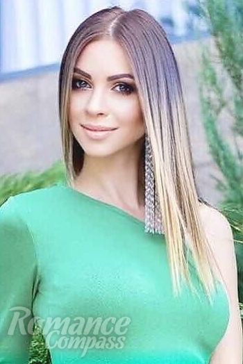 Ukrainian mail order bride Victoria from Nikolaev with light brown hair and blue eye color - image 1