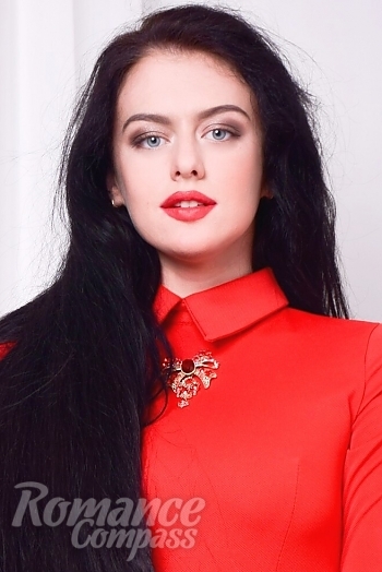 Ukrainian mail order bride Alina from Kiev with black hair and blue eye color - image 1