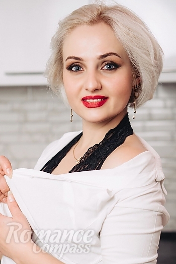 Ukrainian mail order bride Tatyana from Kiev with blonde hair and blue eye color - image 1