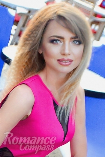 Ukrainian mail order bride Irina from Kiev with blonde hair and green eye color - image 1