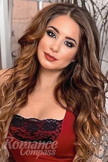 Ukrainian mail order bride Yana from Nikolaev with light brown hair and brown eye color - image 1