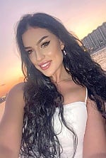 Ukrainian mail order bride Ilona from Kiev with black hair and green eye color - image 8