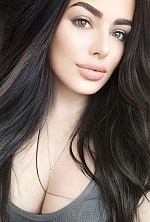 Ukrainian mail order bride Yana from Kiev with black hair and green eye color - image 8