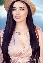 Ukrainian mail order bride Yana from Kiev with black hair and green eye color - image 3