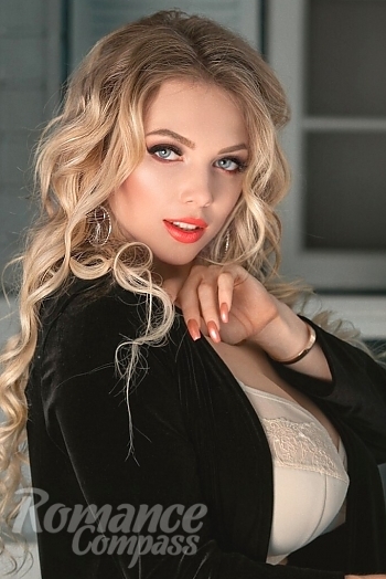 Ukrainian mail order bride Natalia from Lviv with blonde hair and blue eye color - image 1