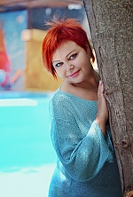 Ukrainian mail order bride Larisa from Kiev with red hair and green eye color - image 4