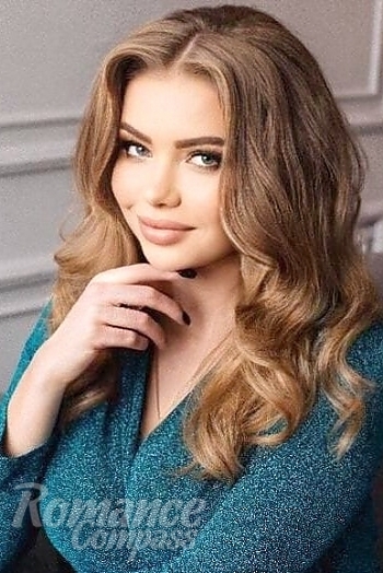 Ukrainian mail order bride Irena from Zhytomyr with light brown hair and green eye color - image 1